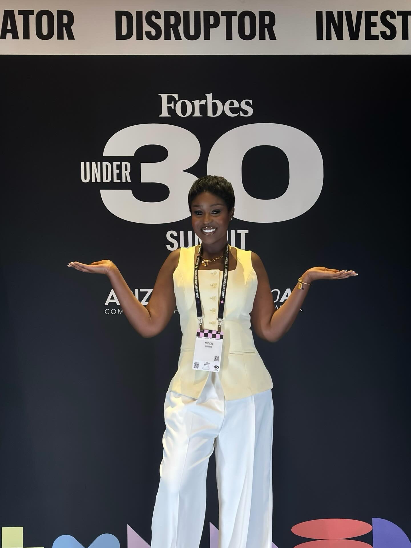 Moon Wurie at the Forbes Under 30 Summit backdrop